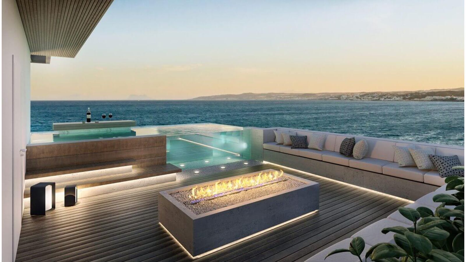 Luxe dakterras met zwembad en uitzicht op zee bij Ikkil Bay.