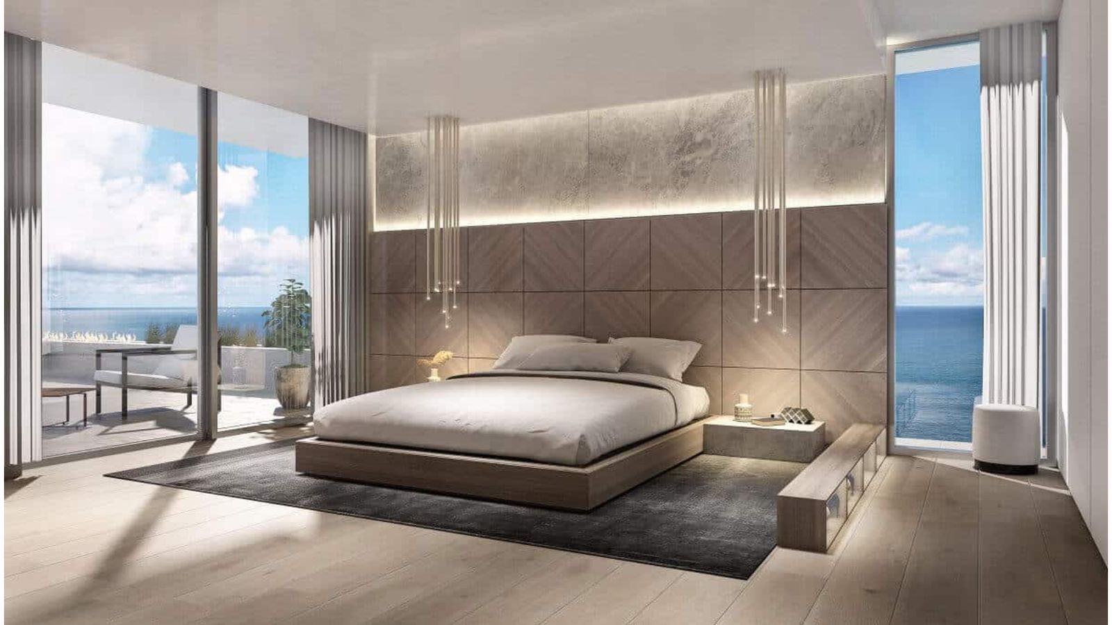 Chambre moderne avec vue sur l'océan et design luxueux.